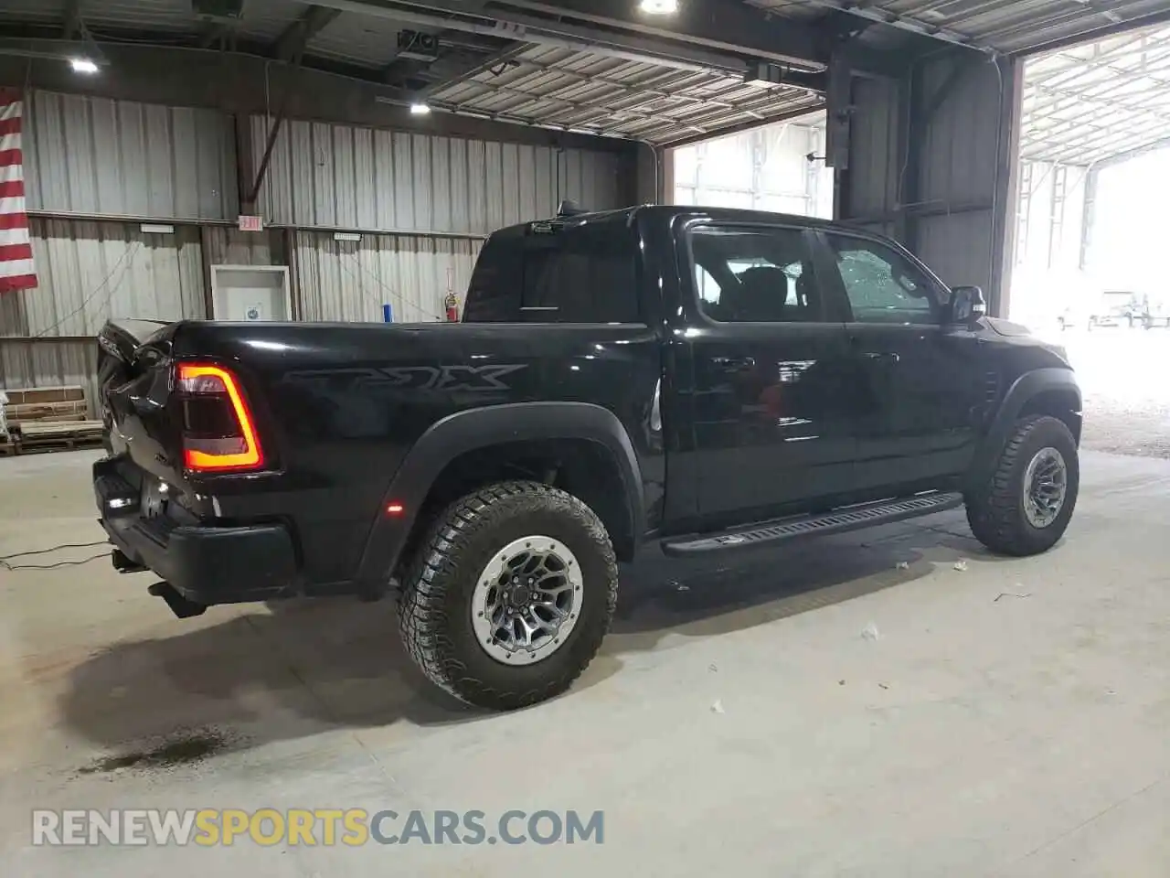 3 Photograph of a damaged car 1C6SRFU99NN320249 RAM 1500 2022