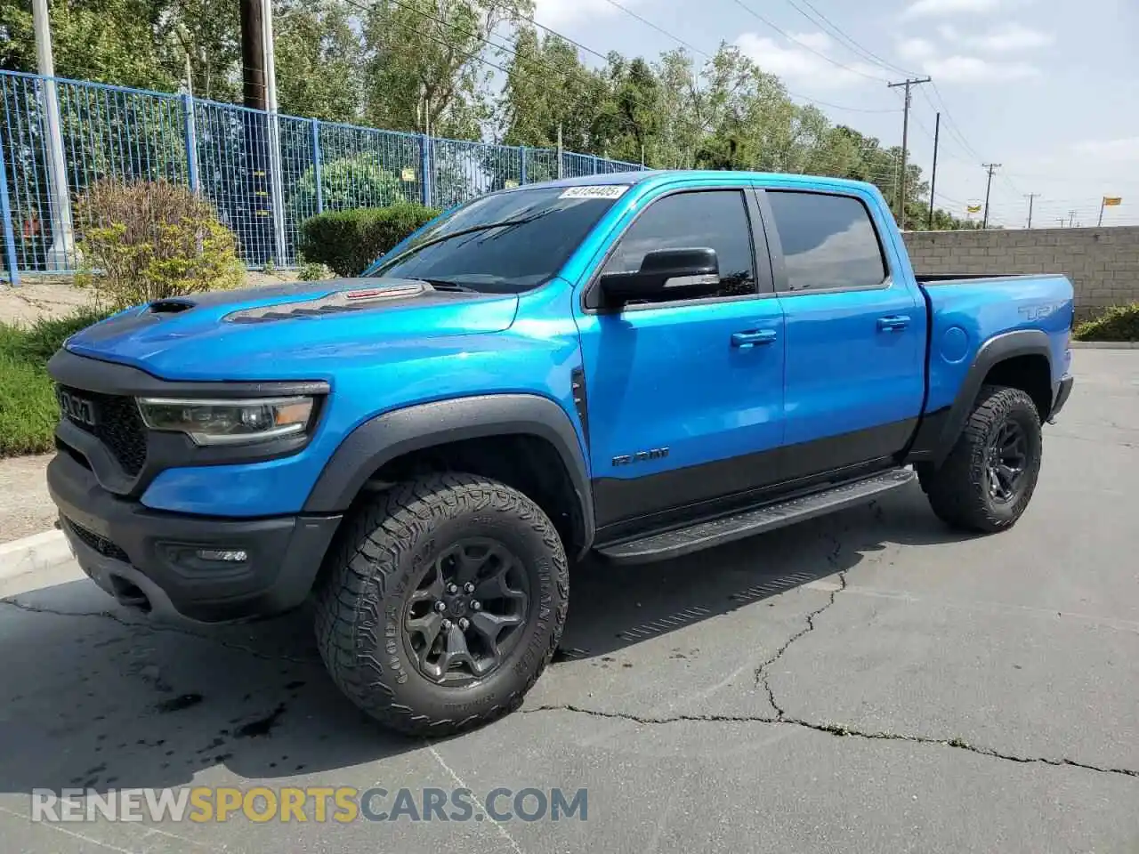 1 Photograph of a damaged car 1C6SRFU9XNN102773 RAM 1500 2022
