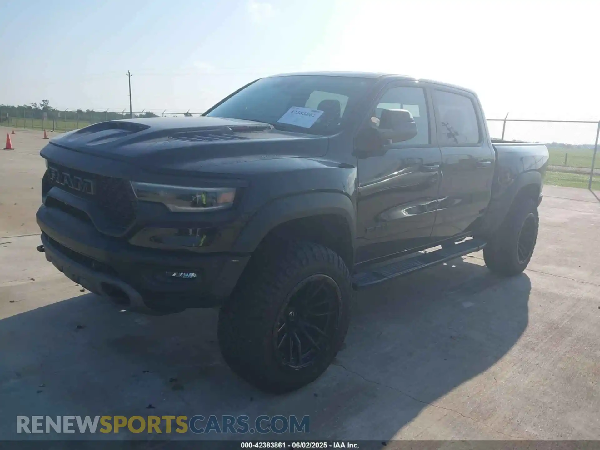 2 Photograph of a damaged car 1C6SRFU9XNN249207 RAM 1500 2022