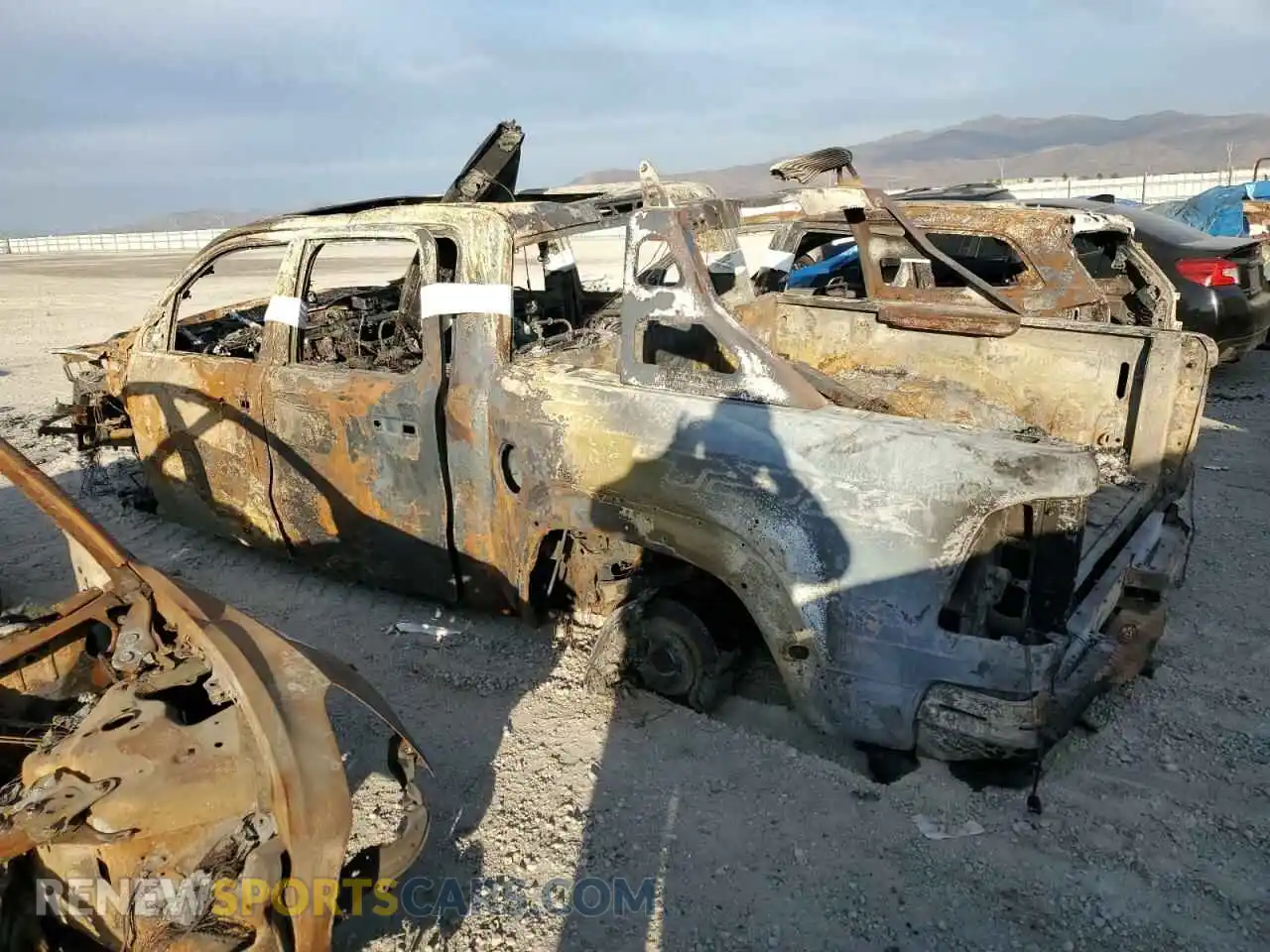 2 Photograph of a damaged car 1C6SRFU9XNN315867 RAM 1500 2022