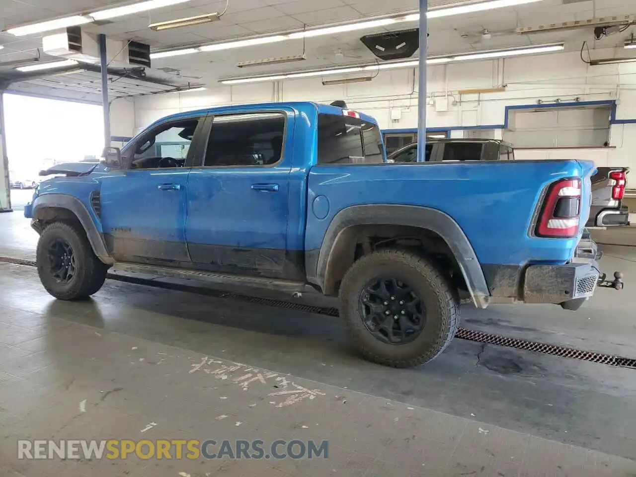 2 Photograph of a damaged car 1C6SRFU9XNN319062 RAM 1500 2022