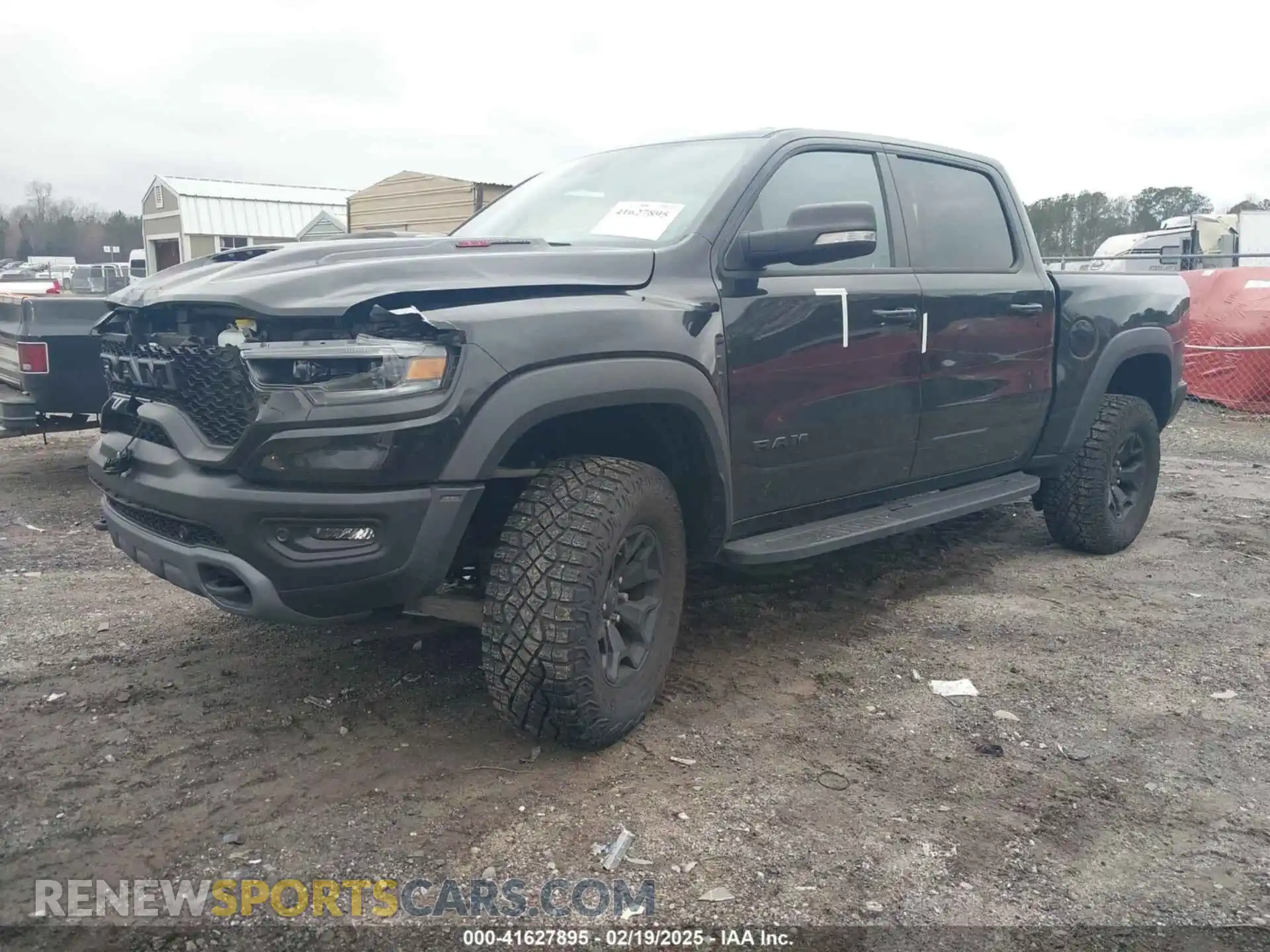 2 Photograph of a damaged car 1C6SRFU9XNN476106 RAM 1500 2022