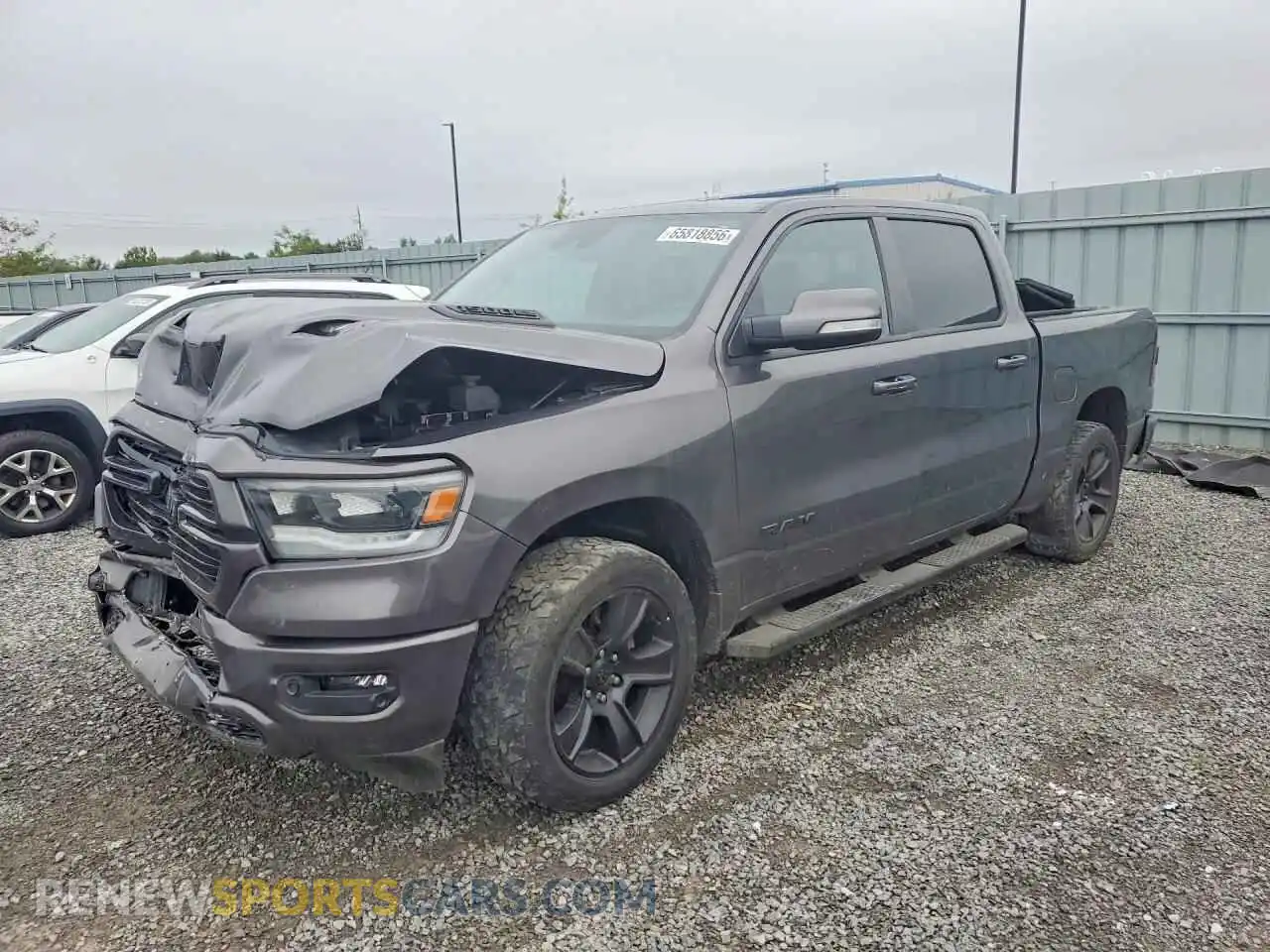 1 Photograph of a damaged car 1C6SRFVT1NN304895 RAM 1500 2022