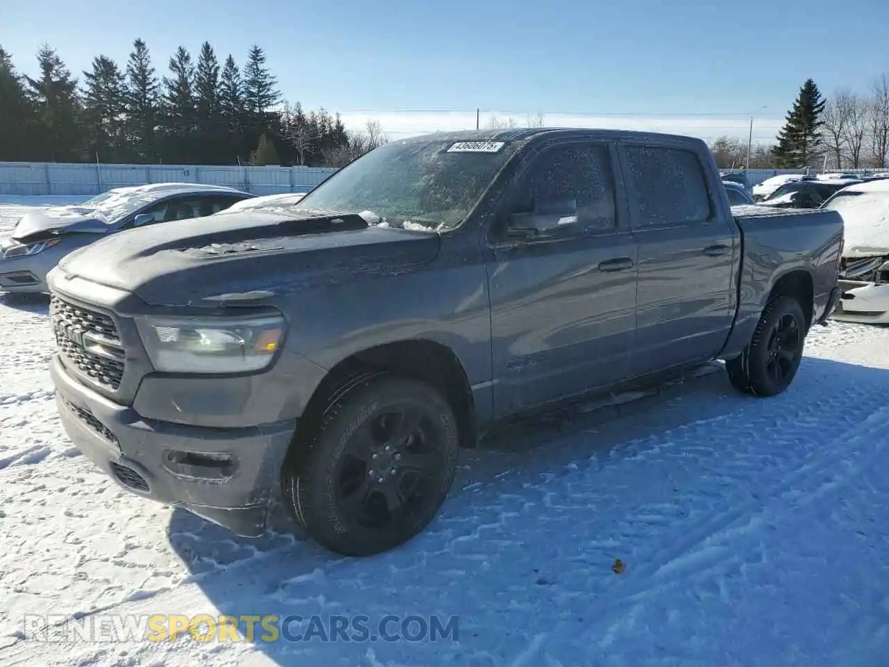 1 Photograph of a damaged car 1C6SRFVT7NN143596 RAM 1500 2022