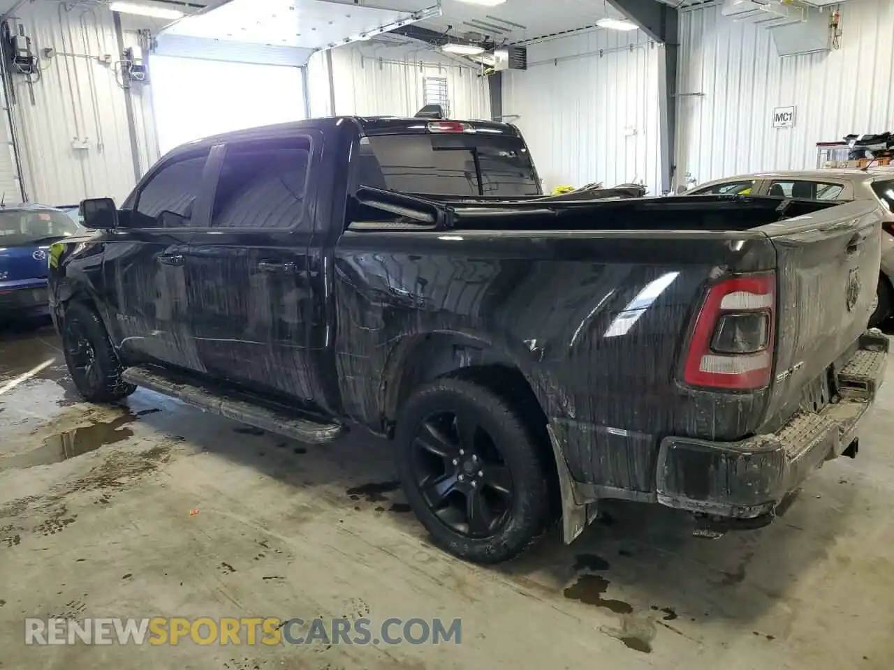 2 Photograph of a damaged car 1C6SRFVT7NN196783 RAM 1500 2022