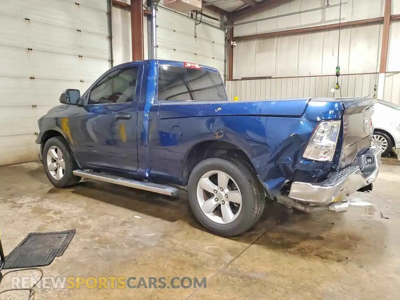 2 Photograph of a damaged car 3C6JR7AT0NG215531 RAM 1500 2022