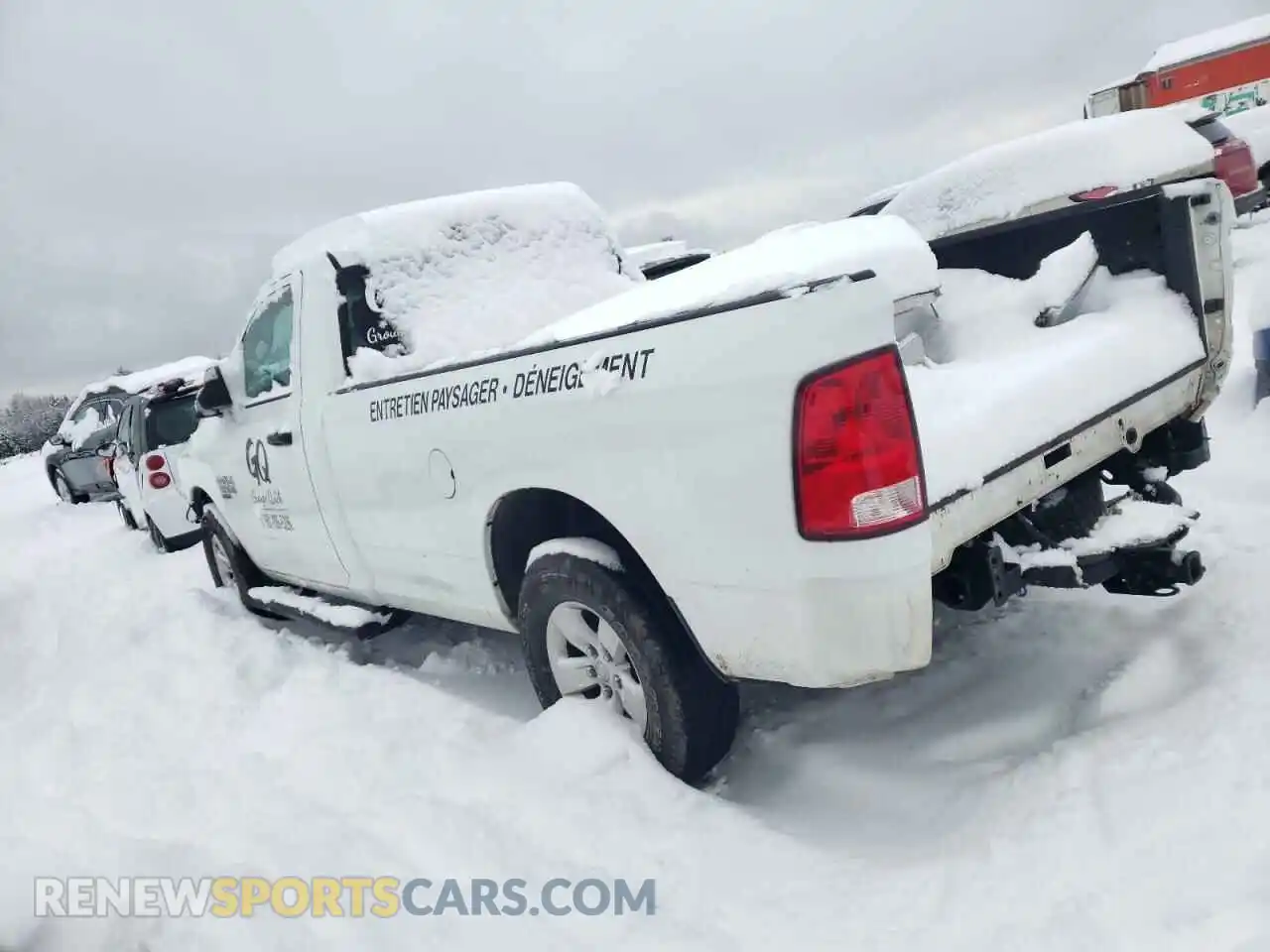 2 Photograph of a damaged car 3C6JR7DG0NG425111 RAM 1500 2022