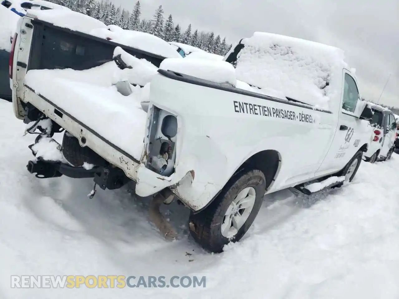 3 Photograph of a damaged car 3C6JR7DG0NG425111 RAM 1500 2022