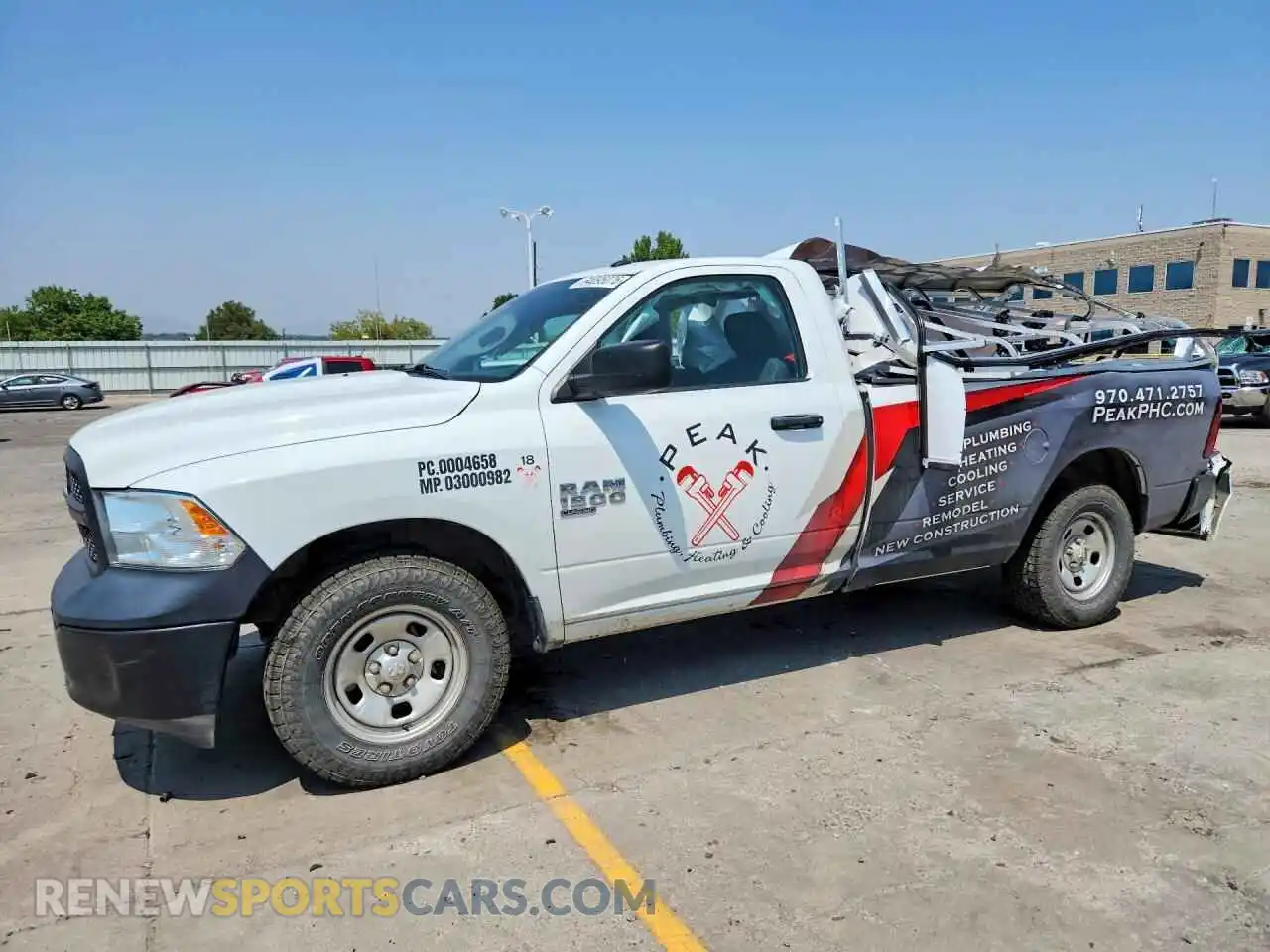 1 Photograph of a damaged car 3C6JR7DG3NG332311 RAM 1500 2022