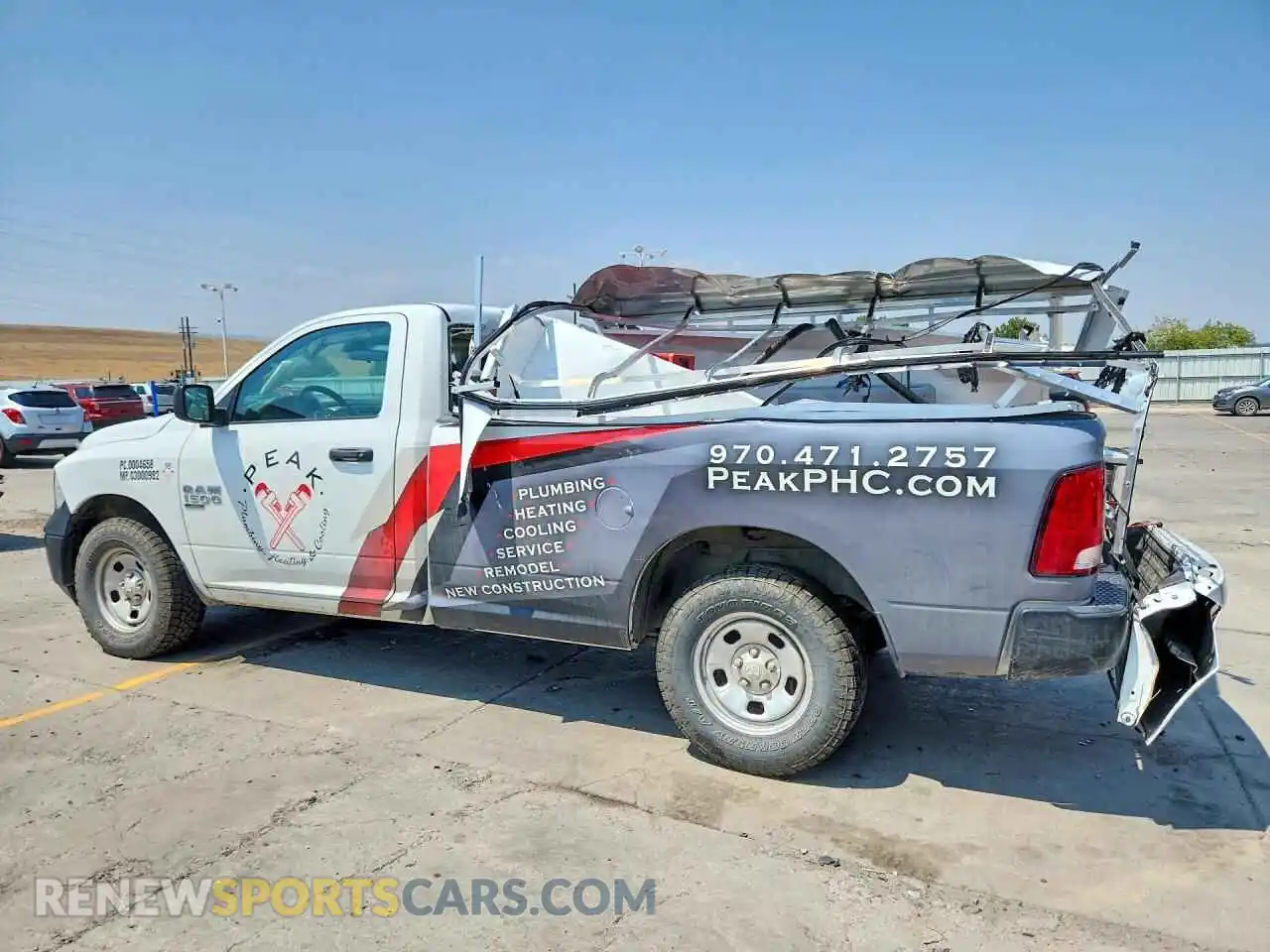 2 Photograph of a damaged car 3C6JR7DG3NG332311 RAM 1500 2022