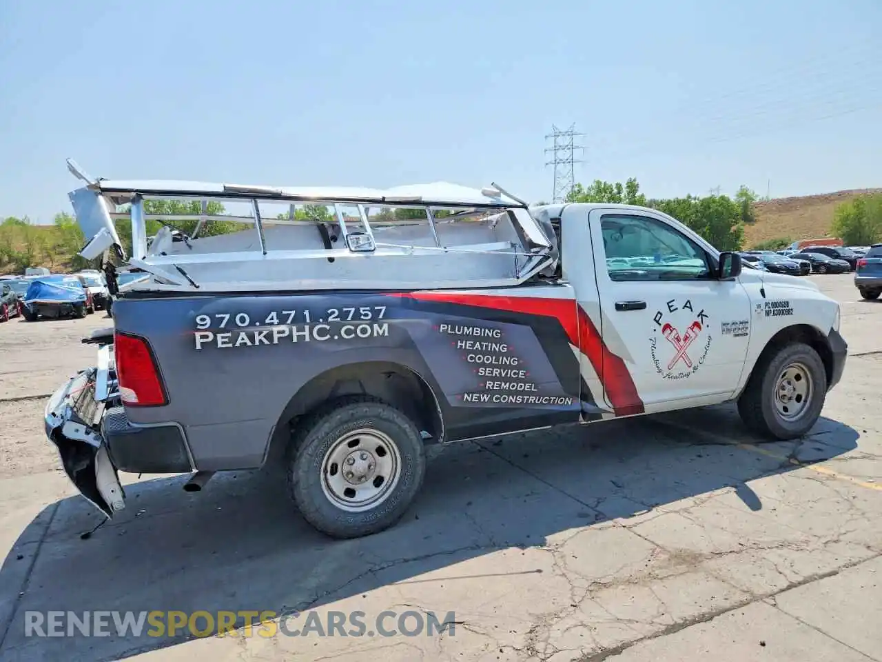 3 Photograph of a damaged car 3C6JR7DG3NG332311 RAM 1500 2022