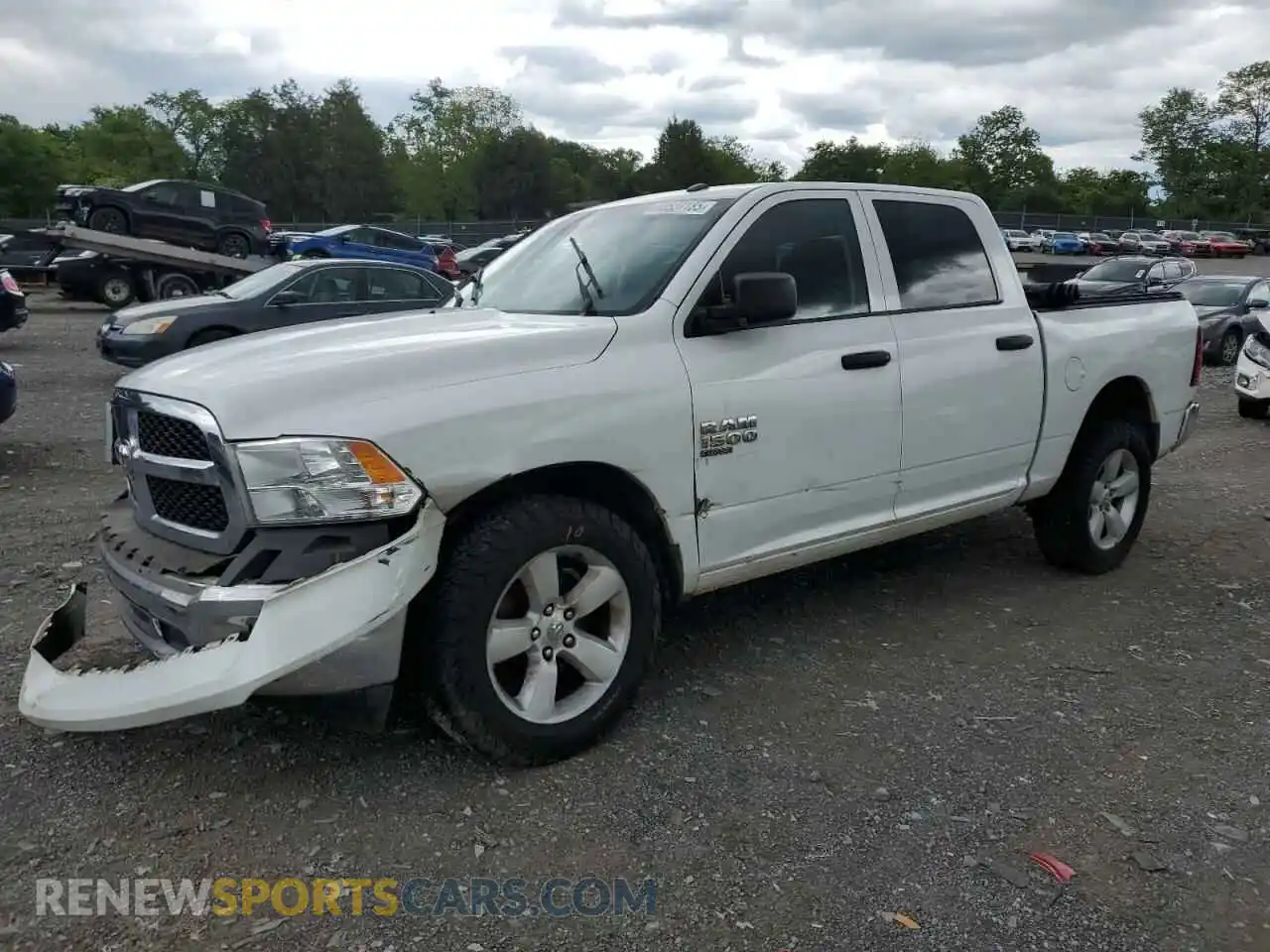 1 Photograph of a damaged car 3C6RR7KG7NG211349 RAM 1500 2022