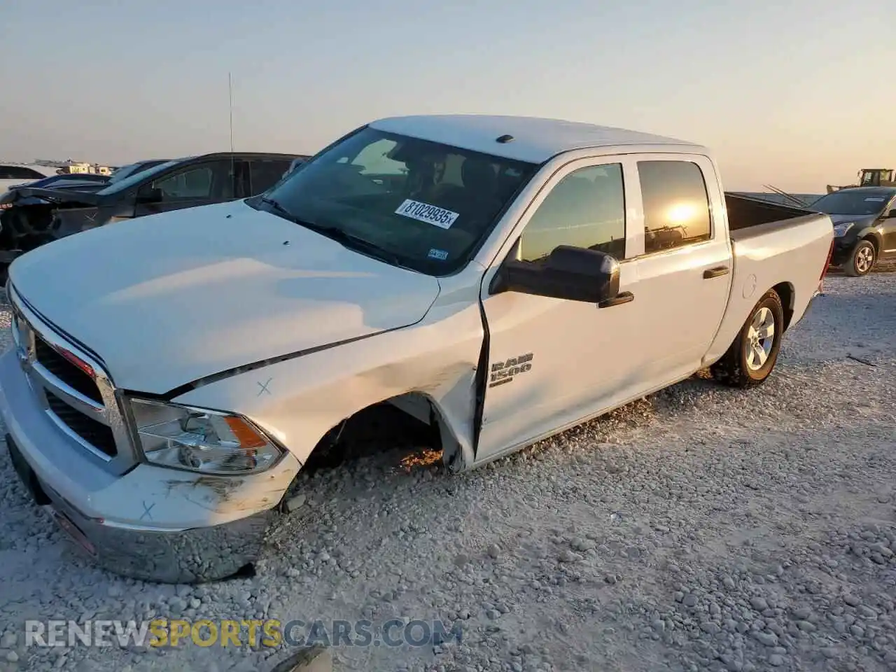 1 Photograph of a damaged car 3C6RR7KG8NG206497 RAM 1500 2022