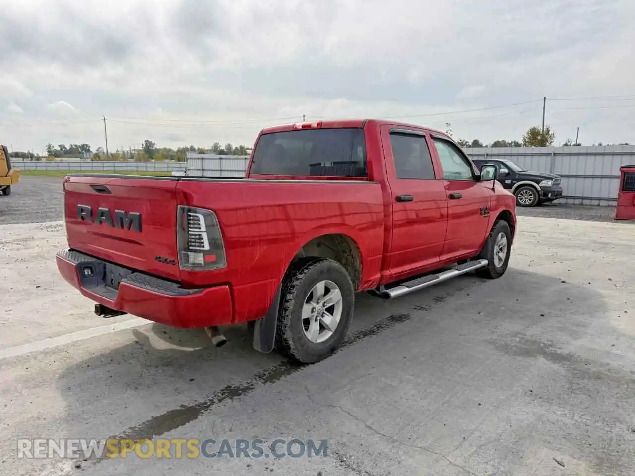 3 Photograph of a damaged car 3C6RR7KGXNG275899 RAM 1500 2022