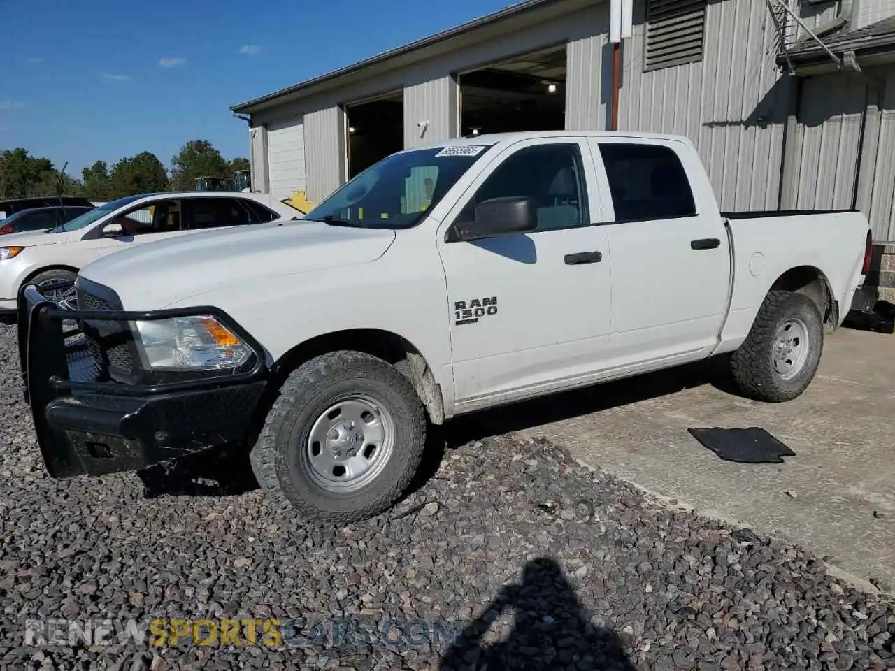 1 Photograph of a damaged car 3C6RR7KGXNG302003 RAM 1500 2022