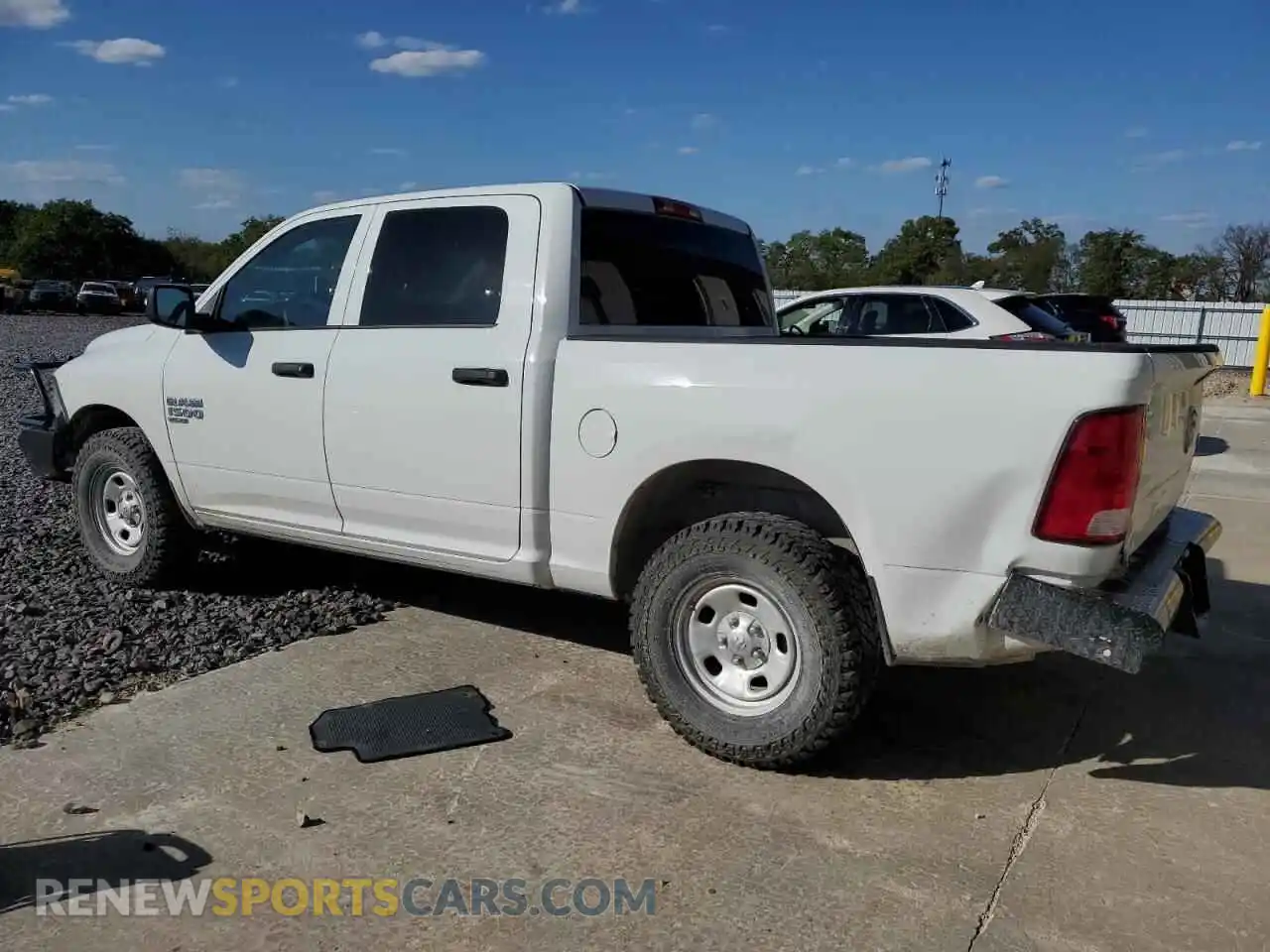 2 Photograph of a damaged car 3C6RR7KGXNG302003 RAM 1500 2022