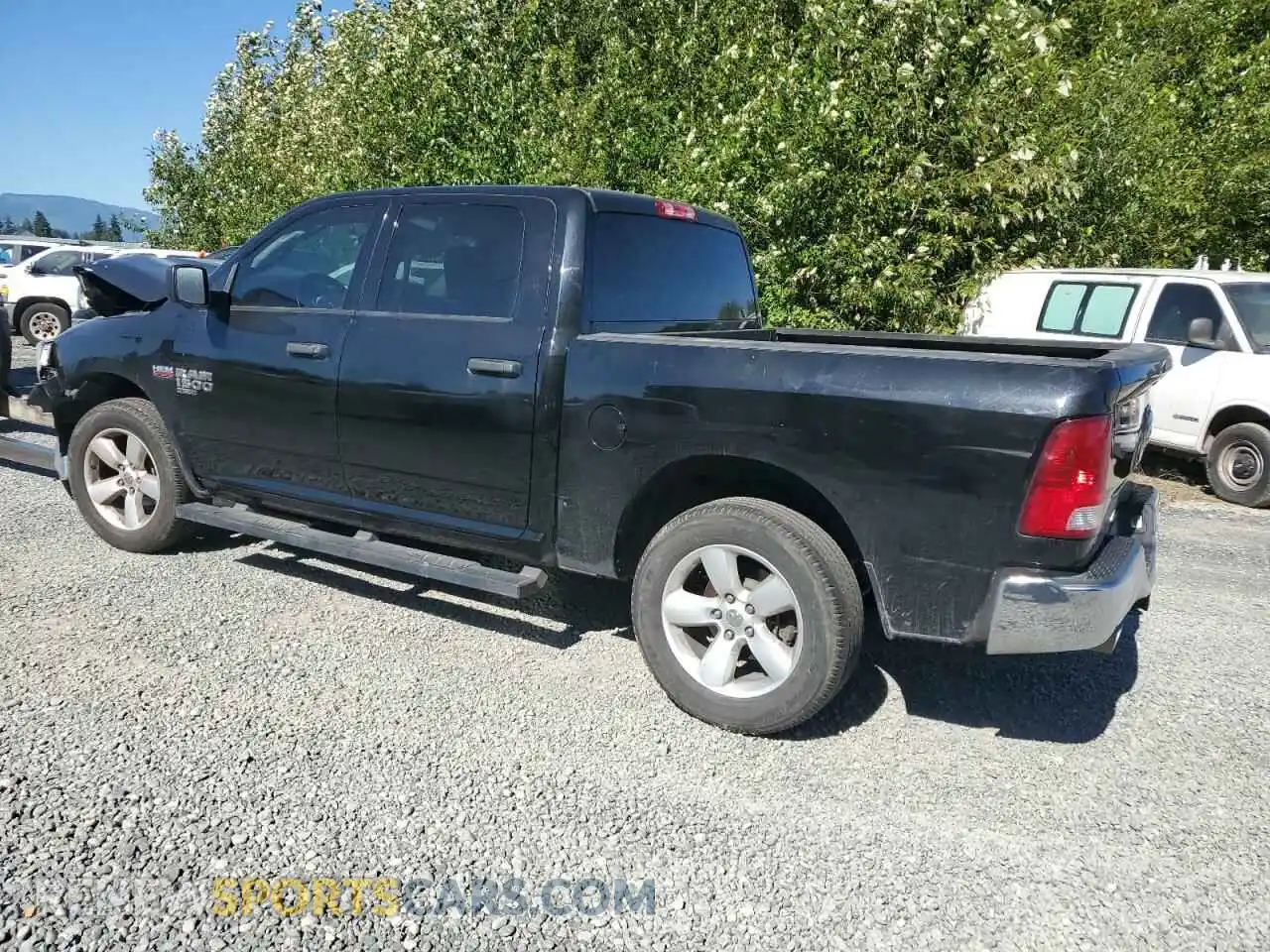 2 Photograph of a damaged car 3C6RR7KT1NG174327 RAM 1500 2022