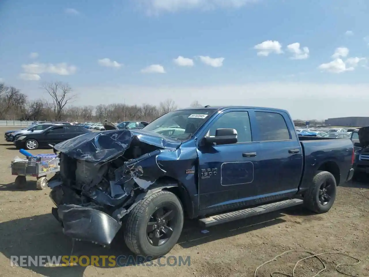1 Photograph of a damaged car 3C6RR7KT6NG352815 RAM 1500 2022