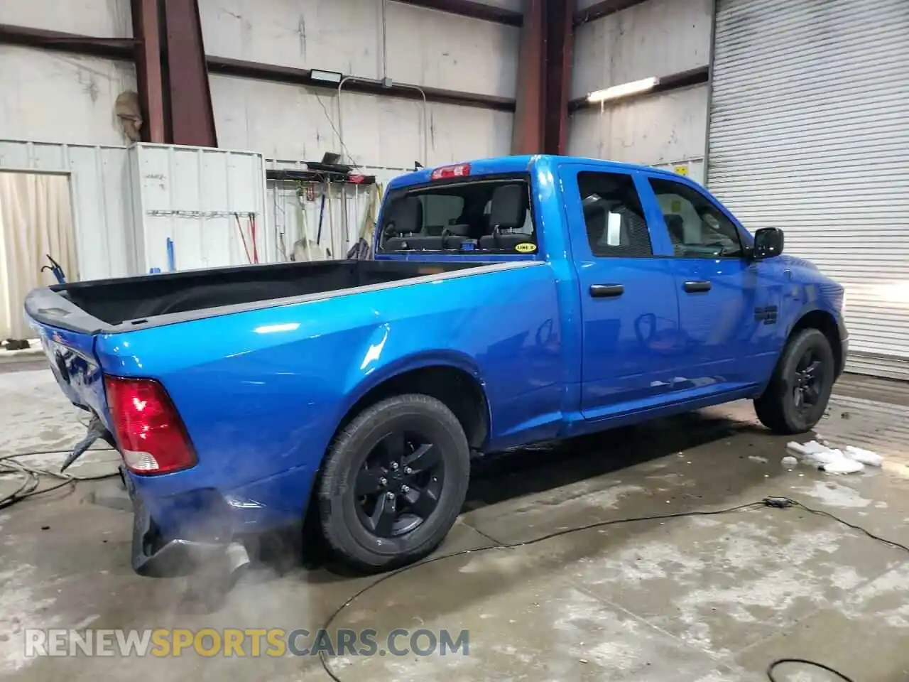 3 Photograph of a damaged car 1C6RR6FG6PS554606 RAM 1500 2023