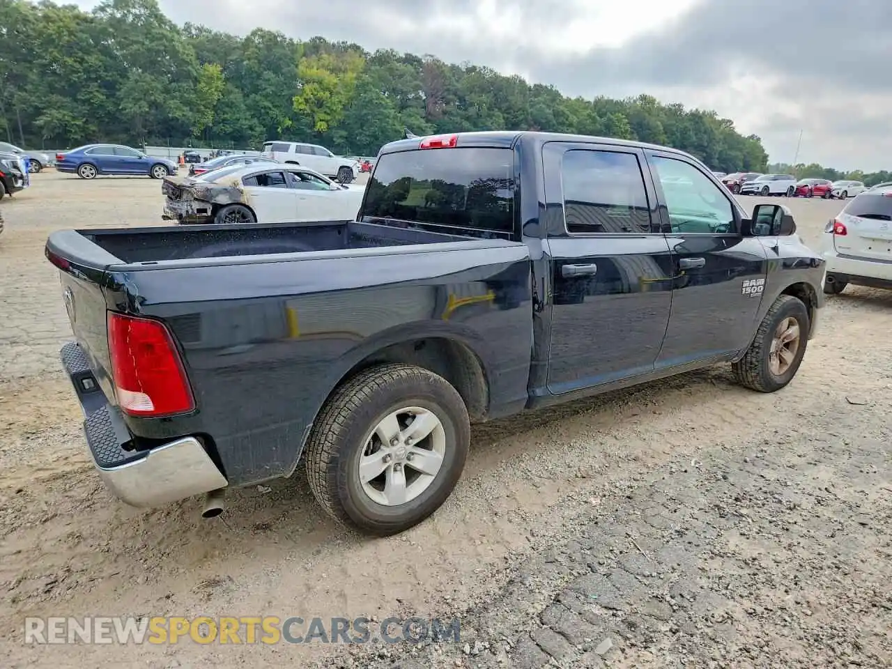 3 Photograph of a damaged car 1C6RR6LG0PS564925 RAM 1500 2023