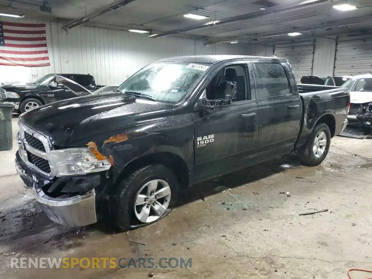 1 Photograph of a damaged car 1C6RR6LG6PS518628 RAM 1500 2023