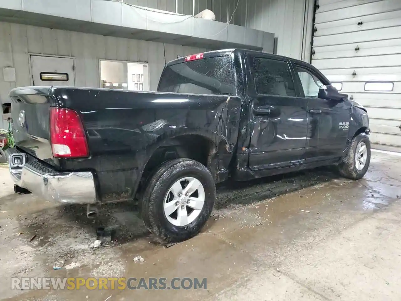 3 Photograph of a damaged car 1C6RR6LG6PS518628 RAM 1500 2023
