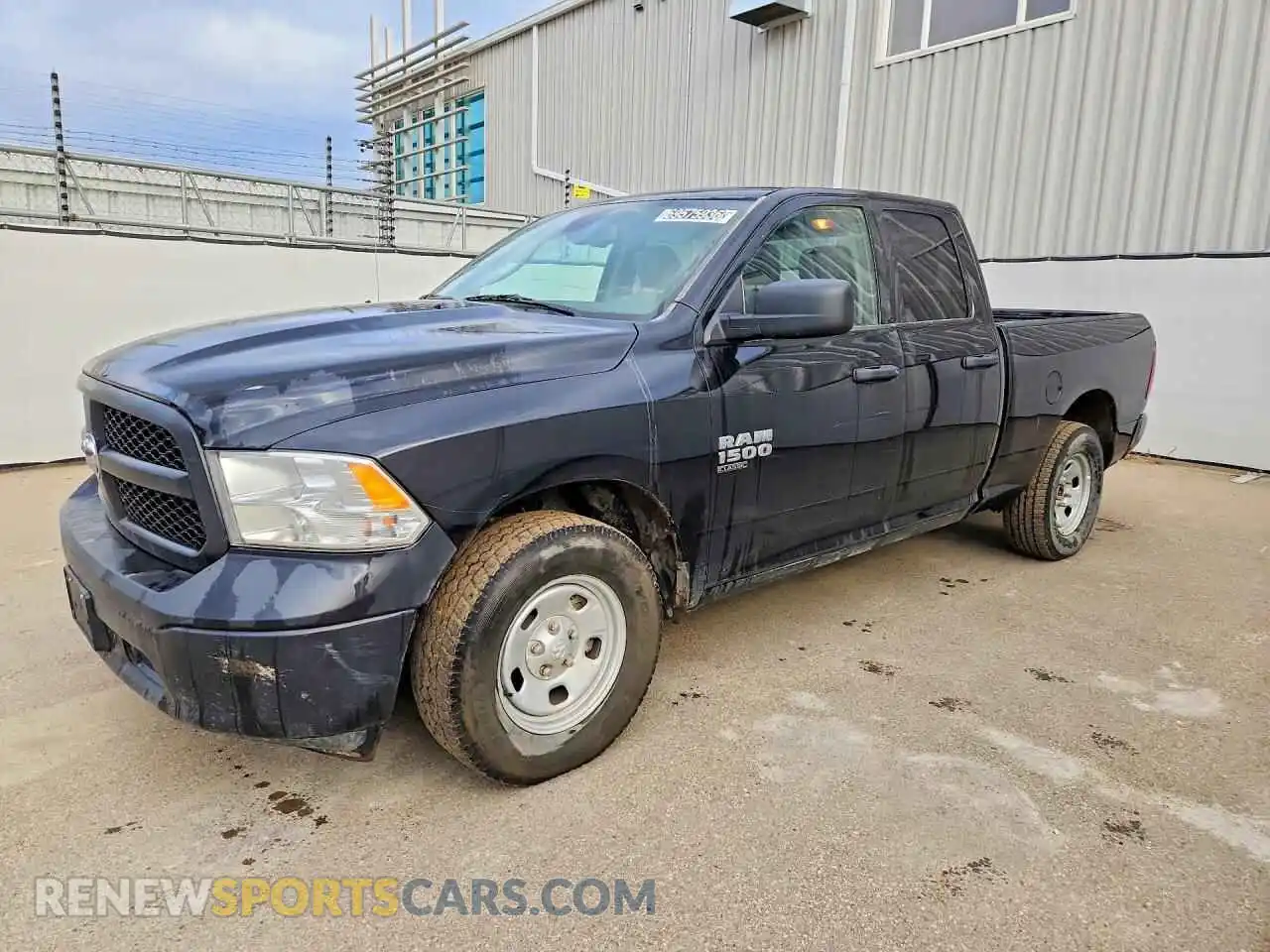 1 Photograph of a damaged car 1C6RR7FG2PS548968 RAM 1500 2023