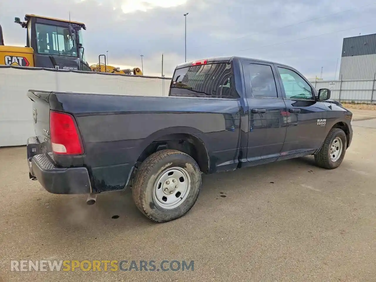 3 Photograph of a damaged car 1C6RR7FG2PS548968 RAM 1500 2023