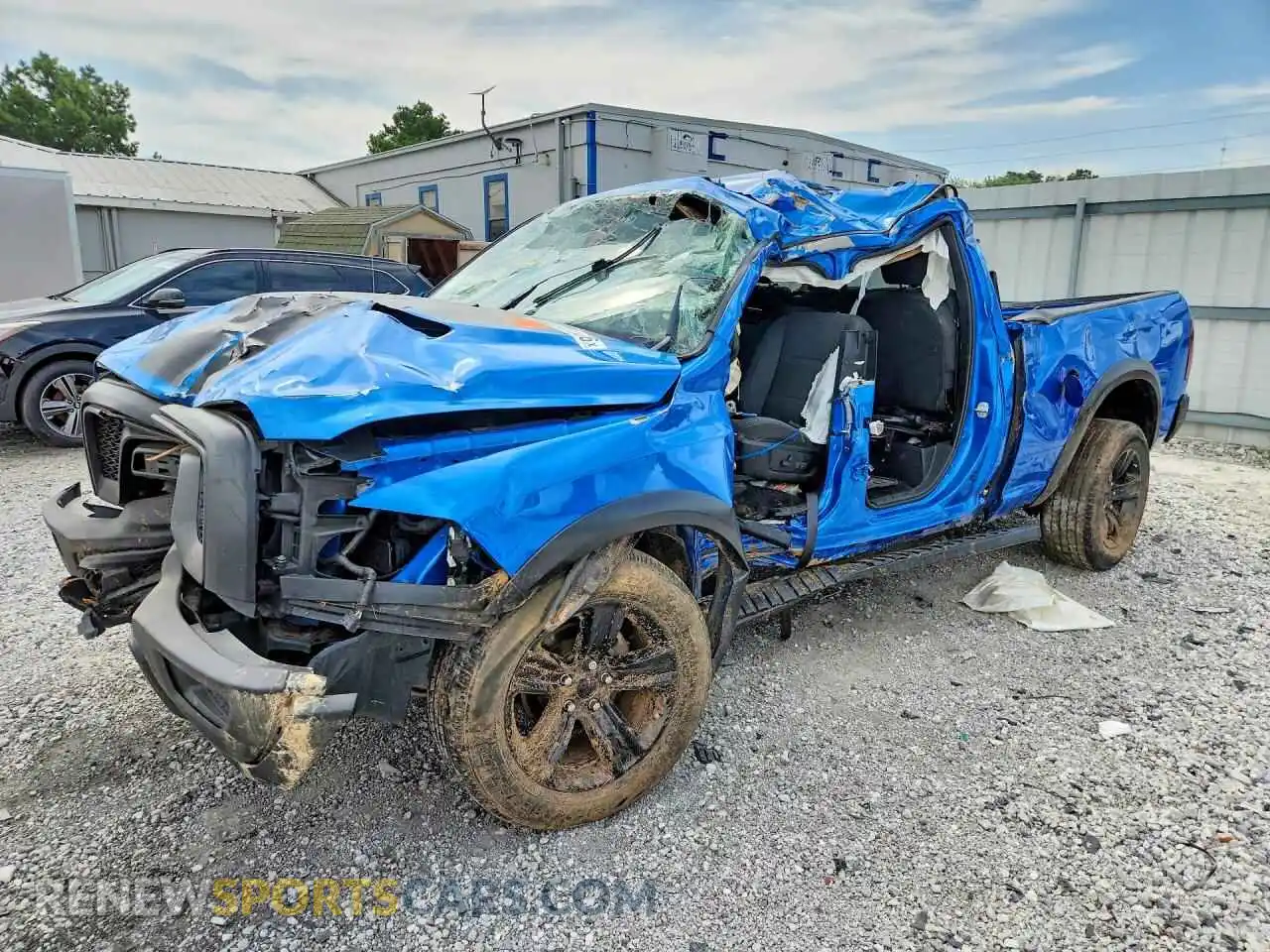 1 Photograph of a damaged car 1C6RR7GG3PS556429 RAM 1500 2023