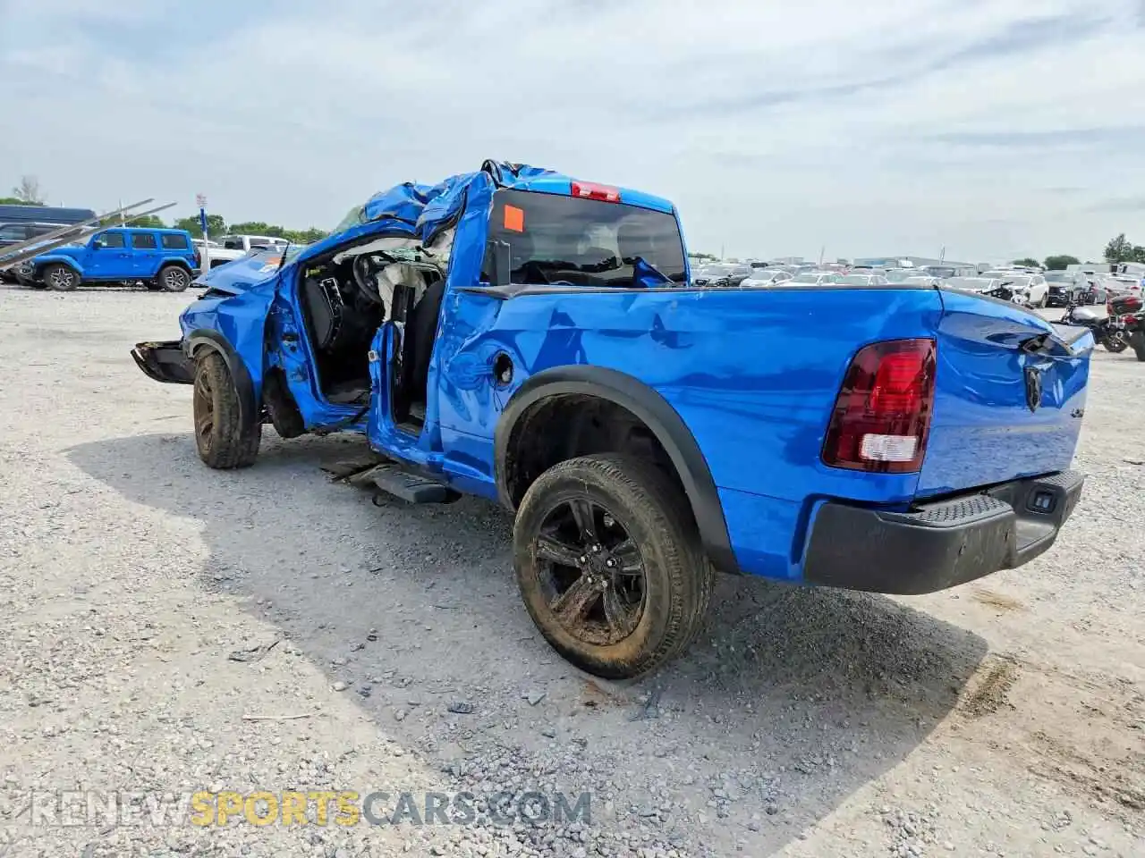 2 Photograph of a damaged car 1C6RR7GG3PS556429 RAM 1500 2023