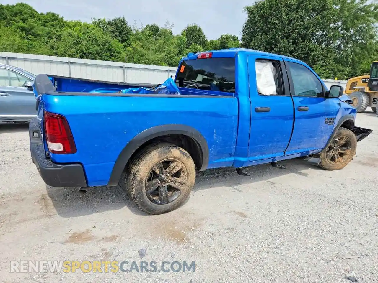 3 Photograph of a damaged car 1C6RR7GG3PS556429 RAM 1500 2023