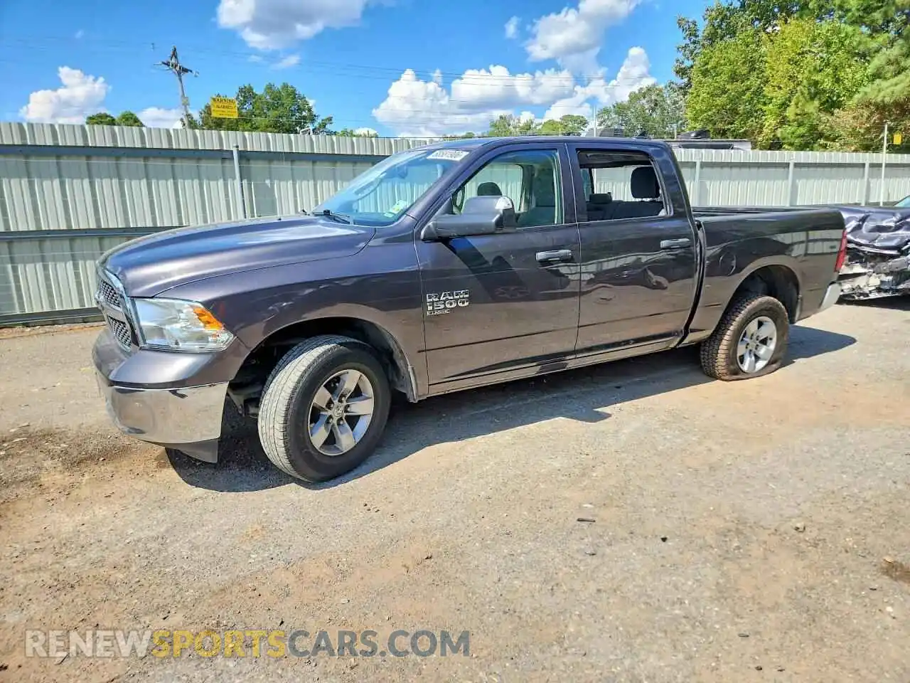 1 Photograph of a damaged car 1C6RR7LG6PS565745 RAM 1500 2023