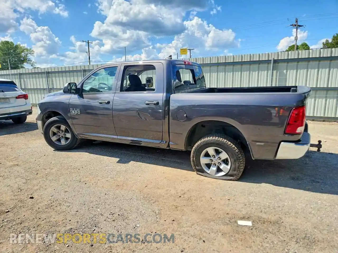2 Photograph of a damaged car 1C6RR7LG6PS565745 RAM 1500 2023