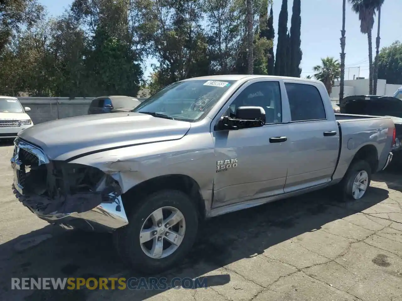 1 Photograph of a damaged car 1C6RR7LG8PS517809 RAM 1500 2023