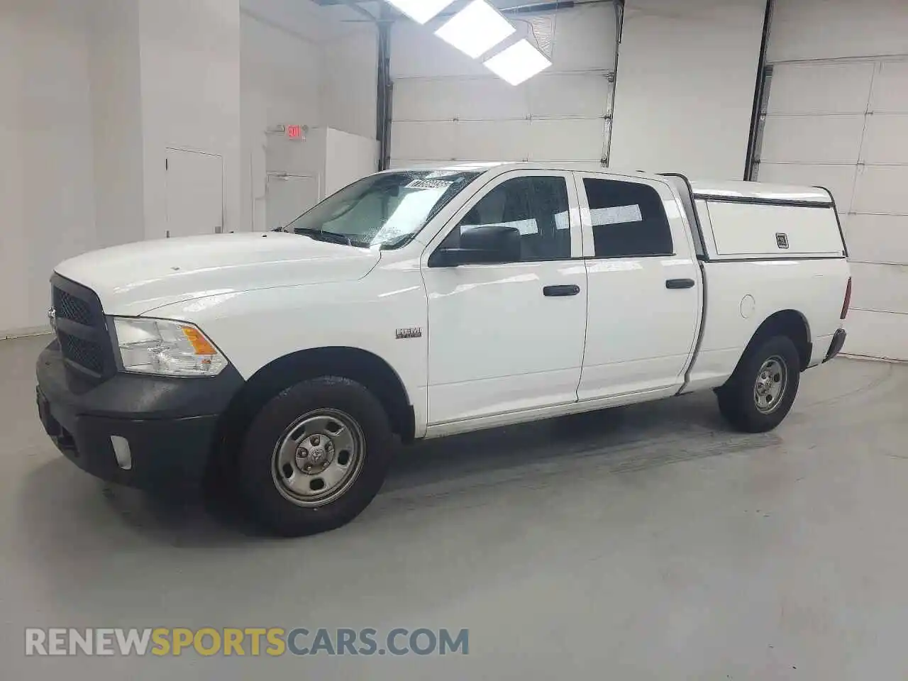 1 Photograph of a damaged car 1C6RR7ST8PS531112 RAM 1500 2023