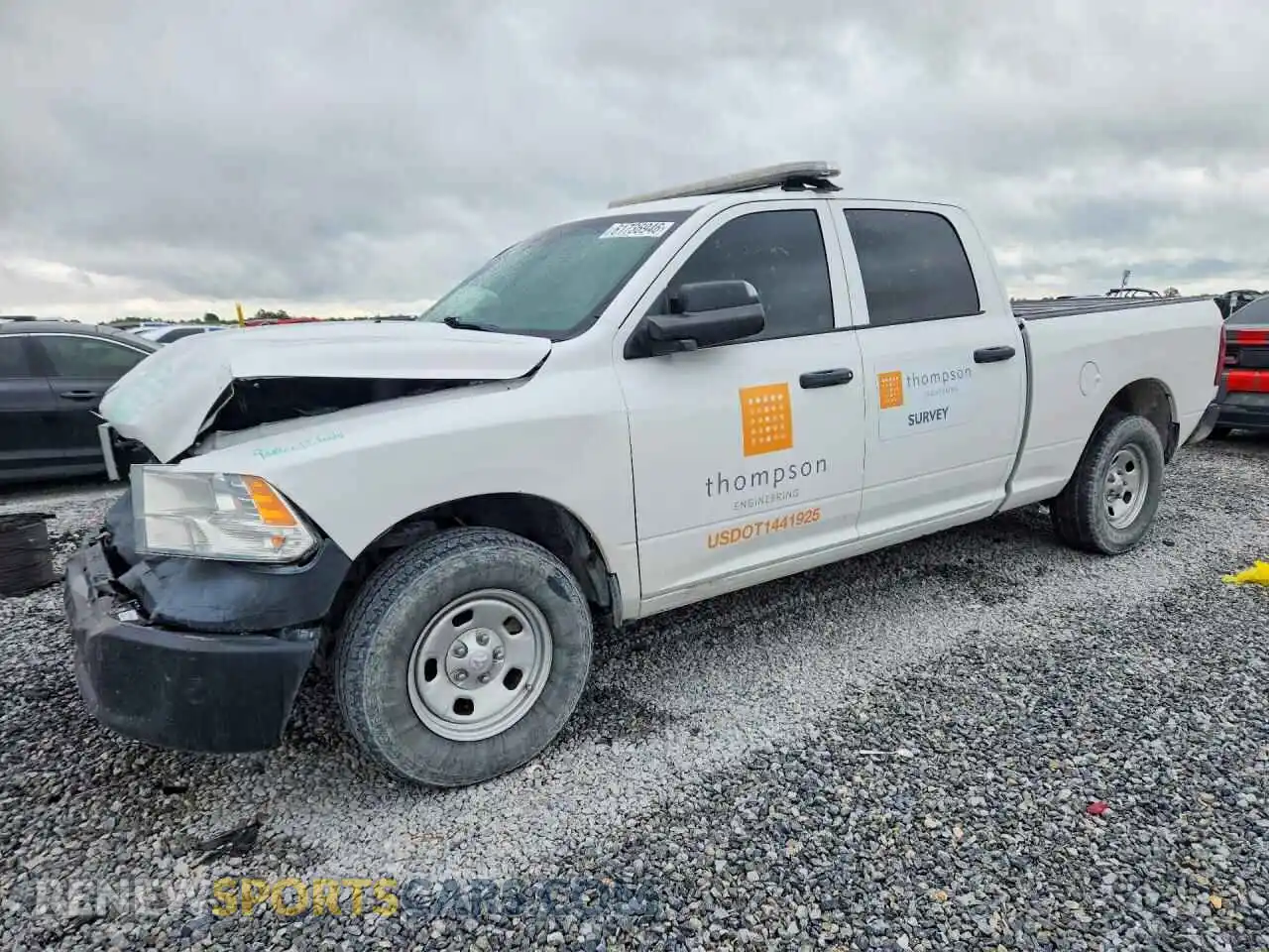 1 Photograph of a damaged car 1C6RR7STXPS527515 RAM 1500 2023