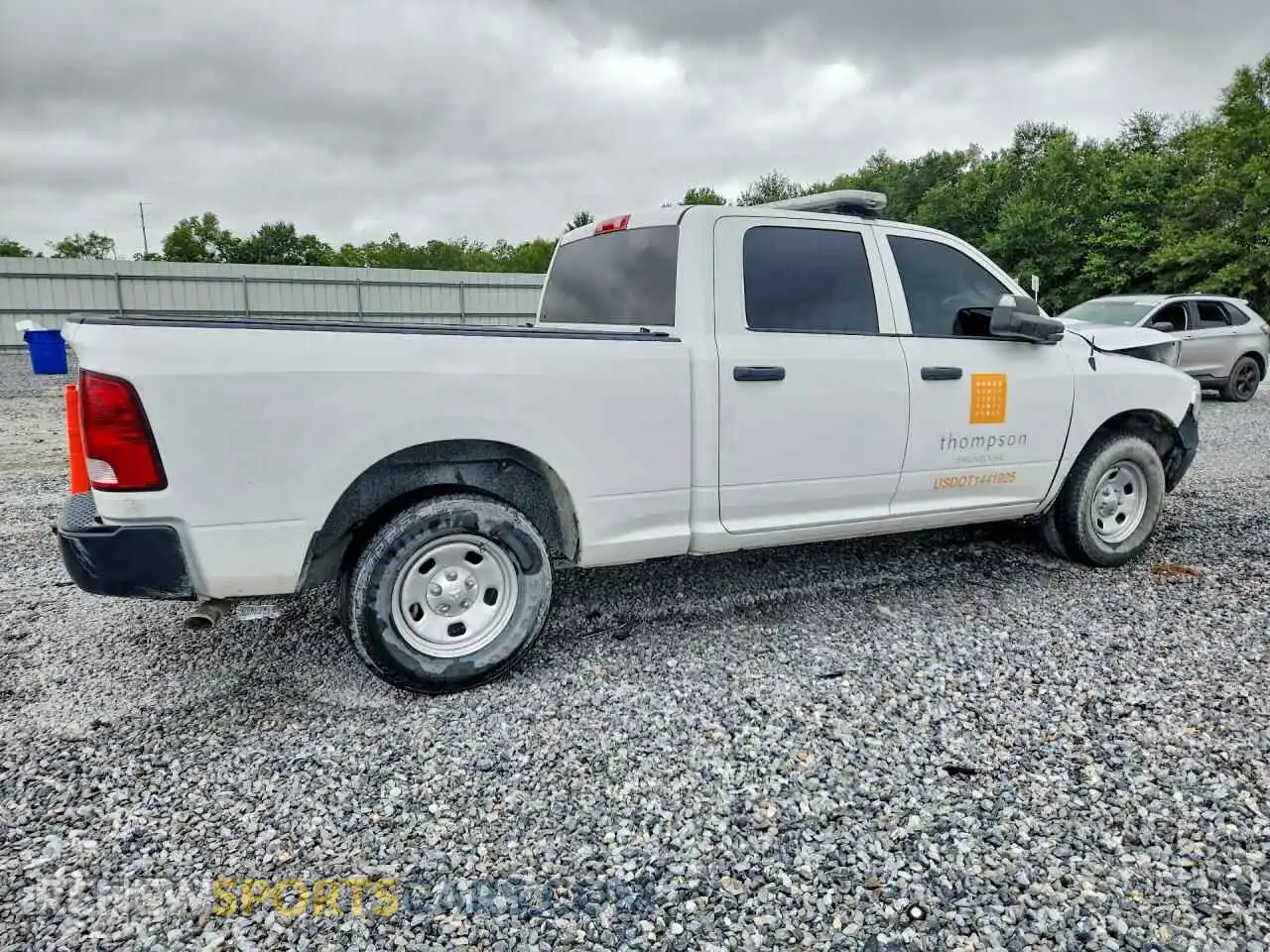 3 Photograph of a damaged car 1C6RR7STXPS527515 RAM 1500 2023