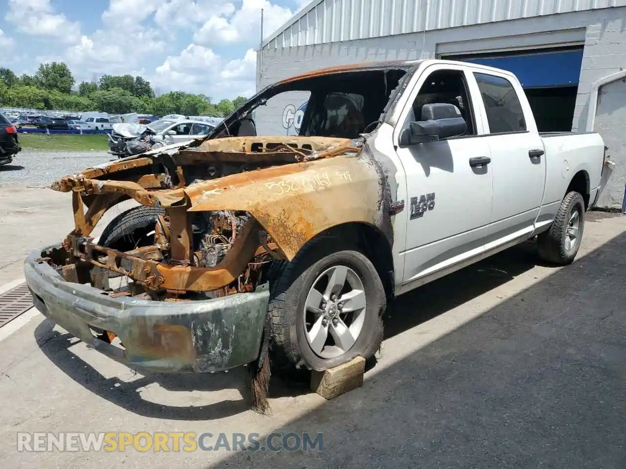 1 Photograph of a damaged car 1C6RR7TT5PS565247 RAM 1500 2023