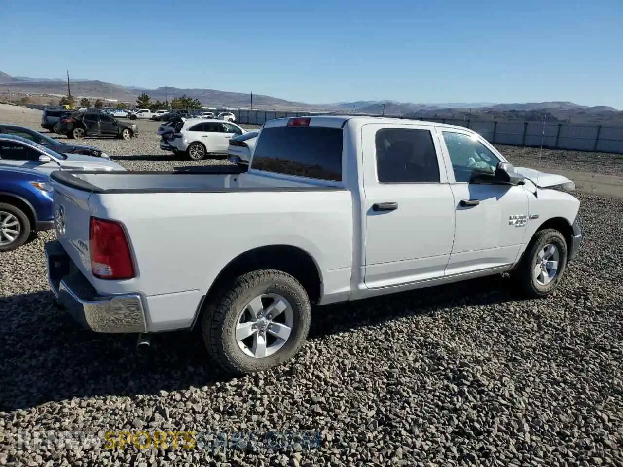 3 Photograph of a damaged car 1C6RR7XT8PS566273 RAM 1500 2023