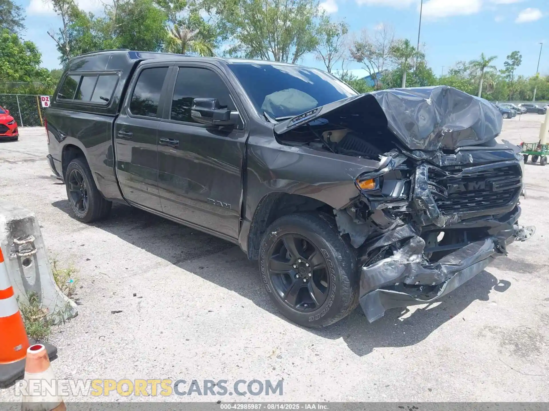 1 Photograph of a damaged car 1C6RREBG0PN585929 RAM 1500 2023