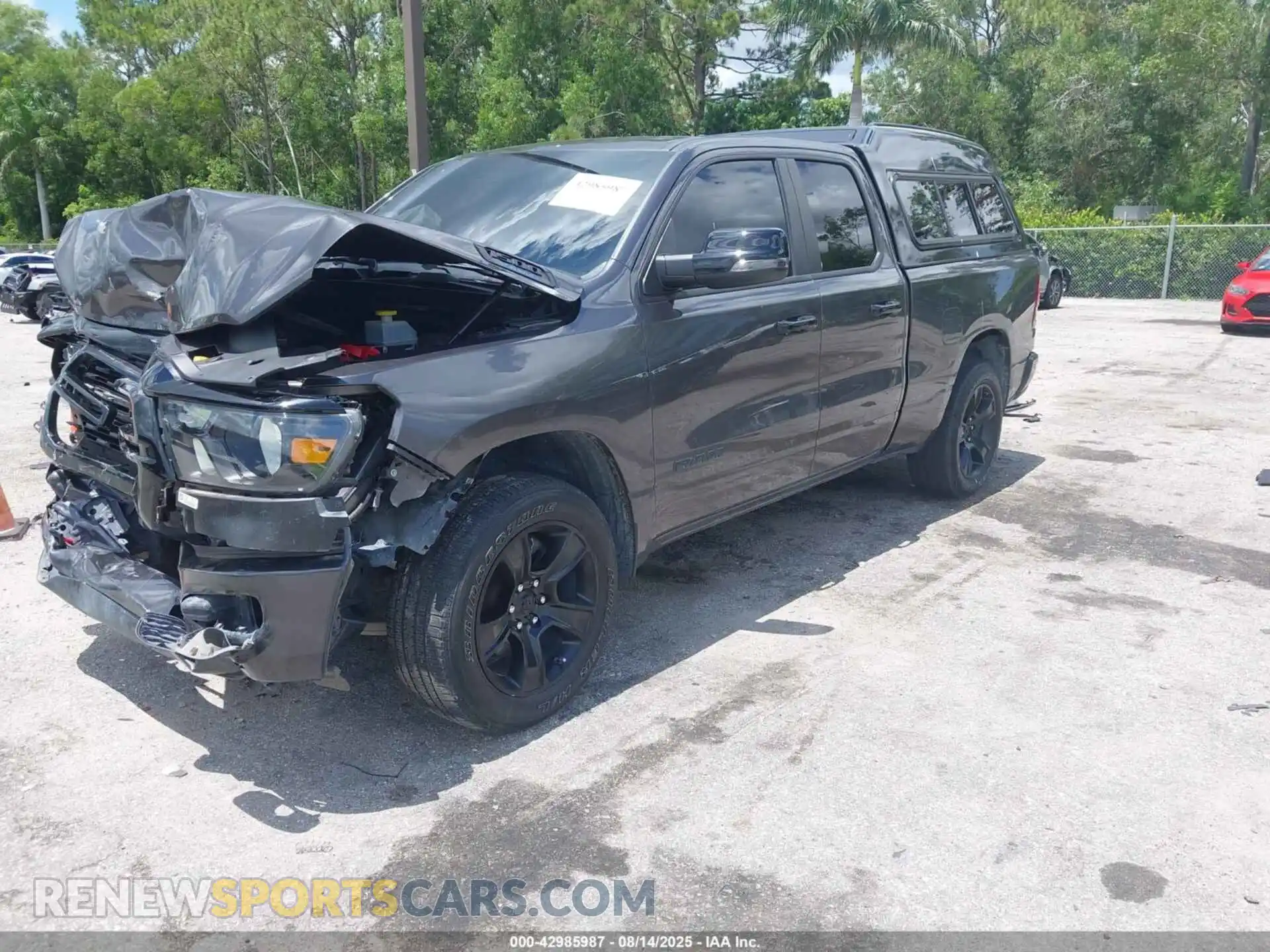 2 Photograph of a damaged car 1C6RREBG0PN585929 RAM 1500 2023