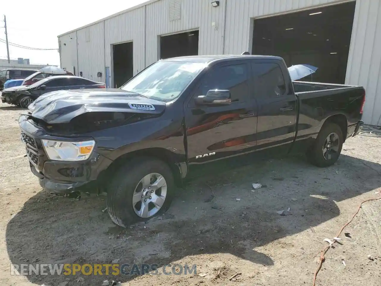 1 Photograph of a damaged car 1C6RREBG5PN604331 RAM 1500 2023
