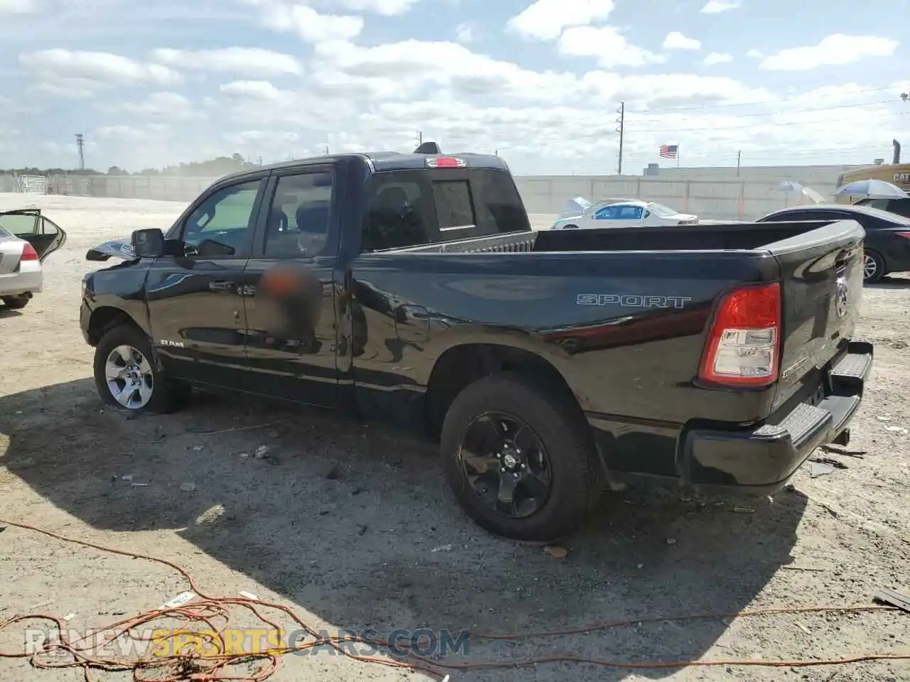 2 Photograph of a damaged car 1C6RREBG5PN604331 RAM 1500 2023