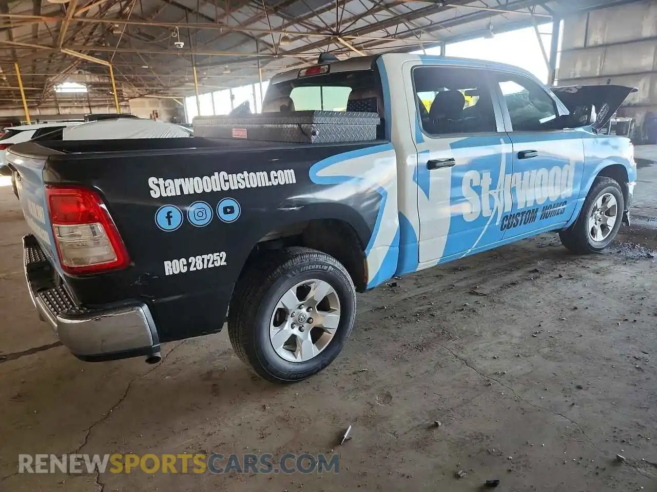 3 Photograph of a damaged car 1C6RREFG0PN640647 RAM 1500 2023