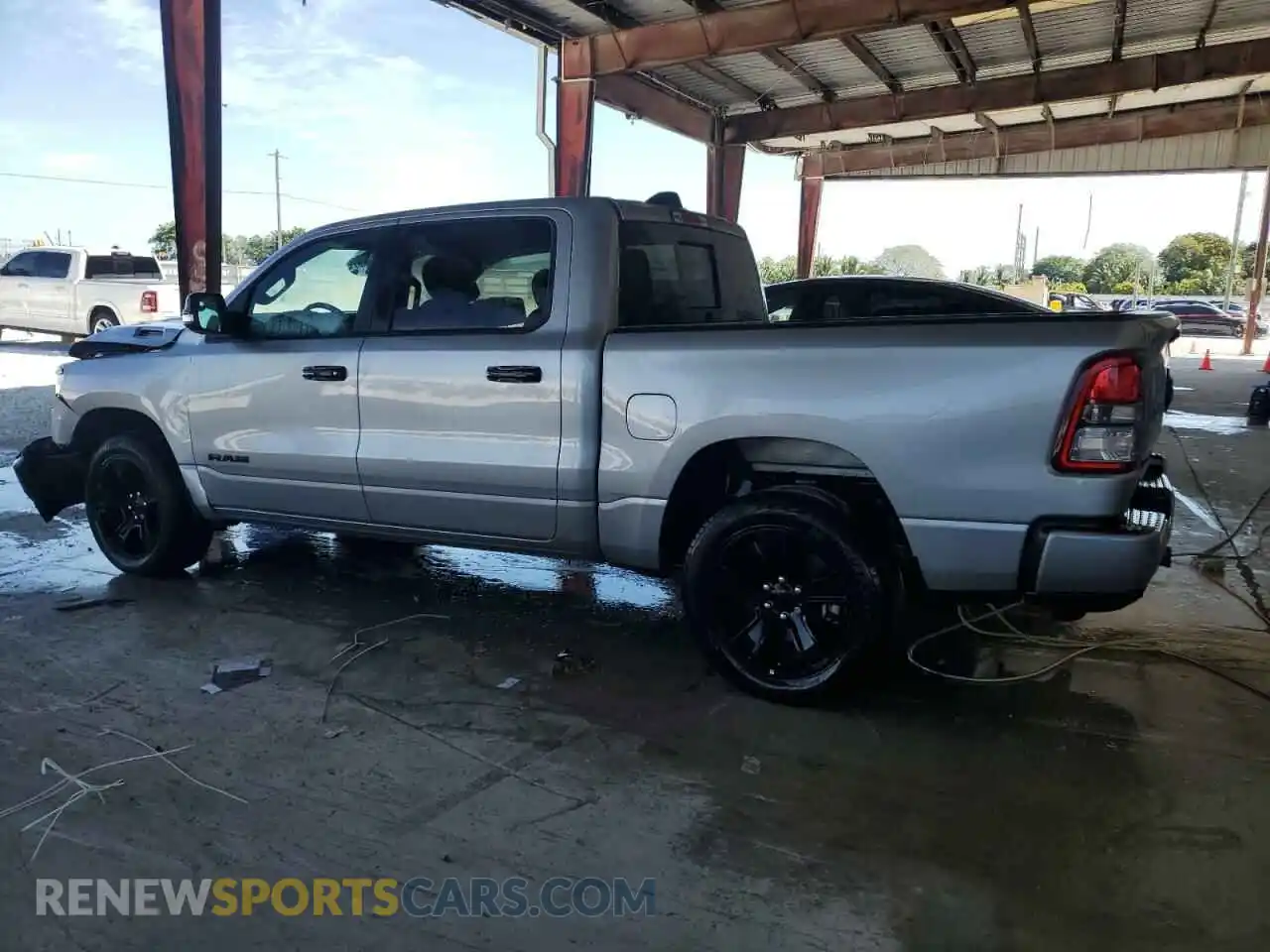 2 Photograph of a damaged car 1C6RREFG5PN654513 RAM 1500 2023