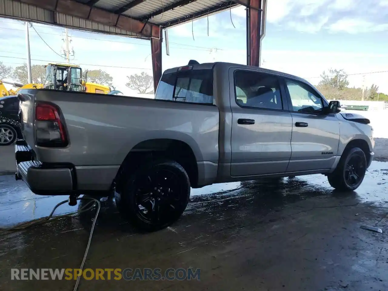 3 Photograph of a damaged car 1C6RREFG5PN654513 RAM 1500 2023
