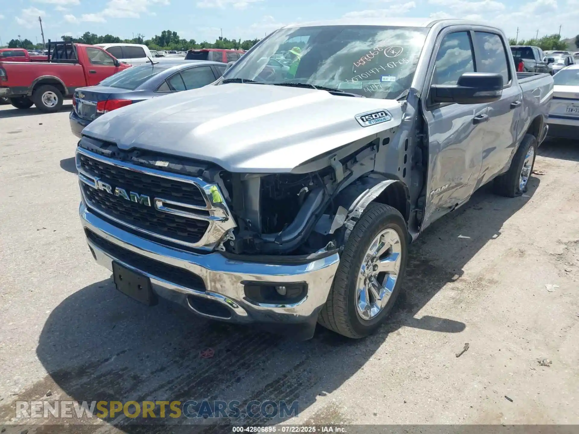 2 Photograph of a damaged car 1C6RREFG9PN604147 RAM 1500 2023