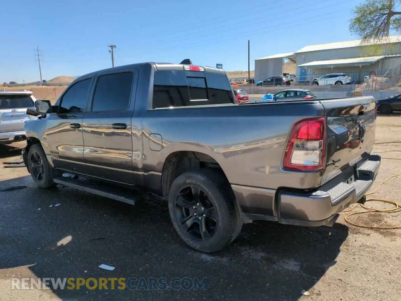 2 Photograph of a damaged car 1C6RREFT0PN694088 RAM 1500 2023