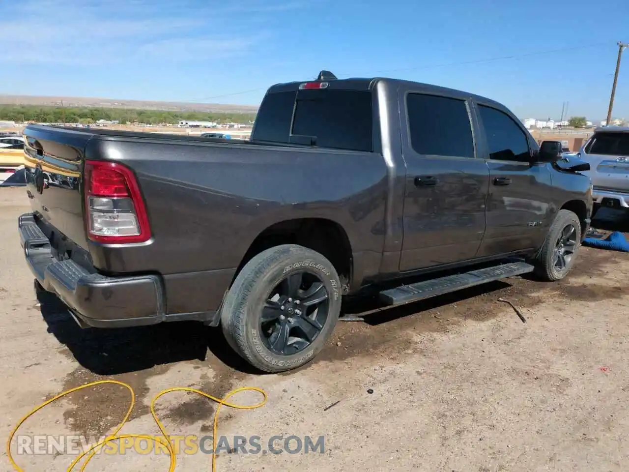 3 Photograph of a damaged car 1C6RREFT0PN694088 RAM 1500 2023