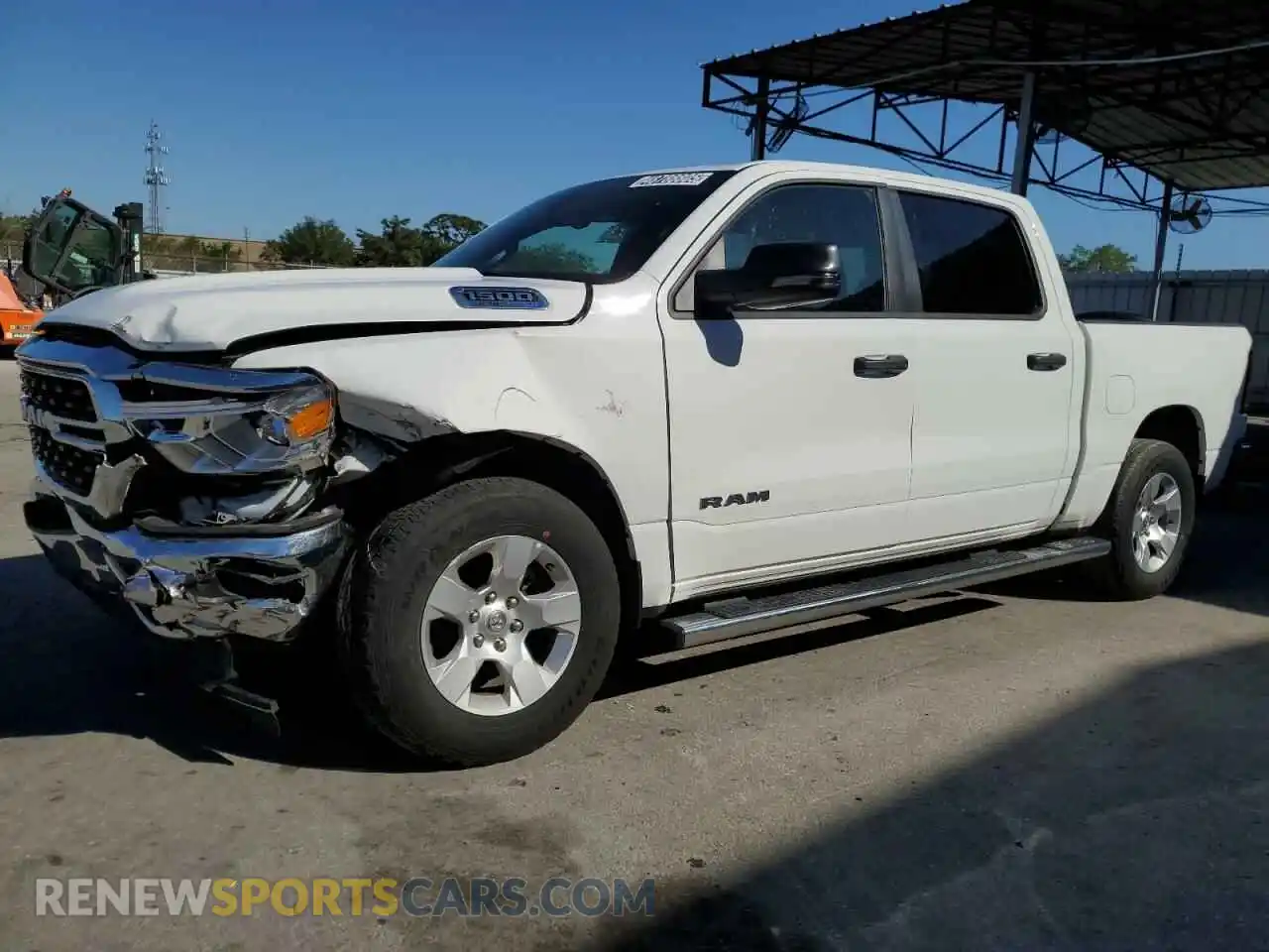 1 Photograph of a damaged car 1C6RREFT1PN614409 RAM 1500 2023